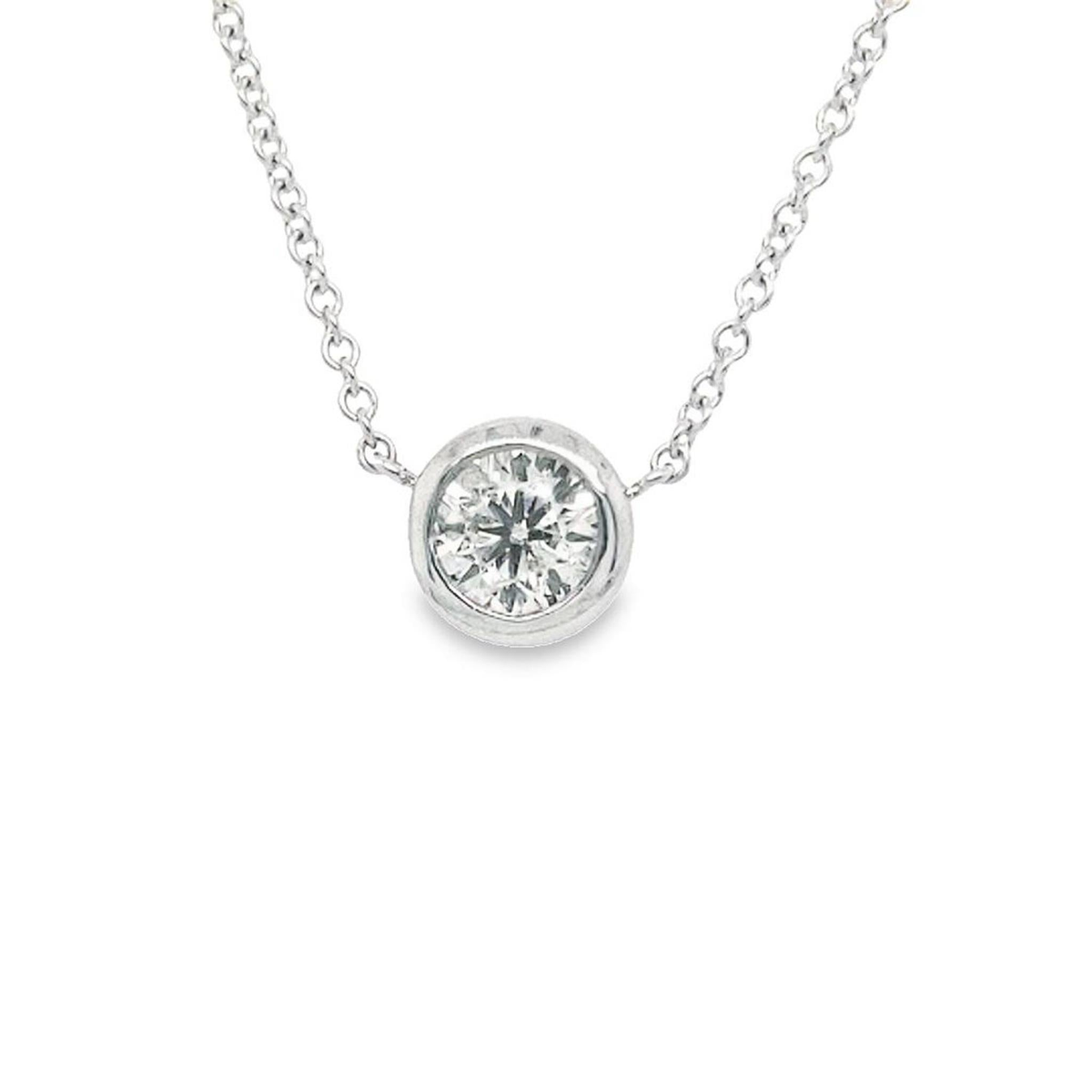 One and Only 18Kt White Gold Bezel Set Solitaire Pendant with .72cttw Natural Diamond