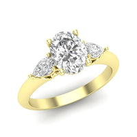 14Kt Yellow Gold Ring Mounting With .40cttw Pear-Shape Diamonds And Designer Profile