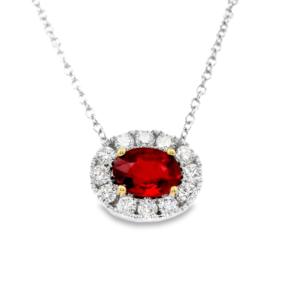 Center of My World 14Kt White Gold Halo Pendant with .84Ct Oval Ruby and .35cttw Natural Diamonds