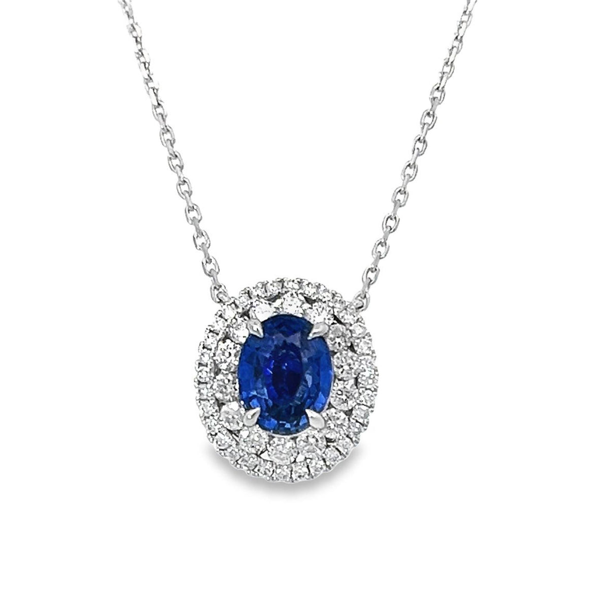 18Kt White Gold Halo Pendant With 2.14ct Oval Fine Blue Sapphire