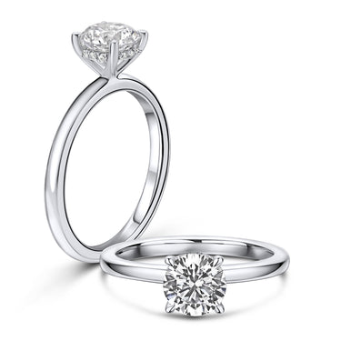 Fire & Ice 18 Kt White Gold Solitaire Engagement Ring with .75ct Natural Diamond Center and .05ctw Accent Natural Diamonds