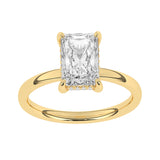 yellow gold engagement ring featuring a brilliant-cut diamond solitaire in a four-prong setting.
