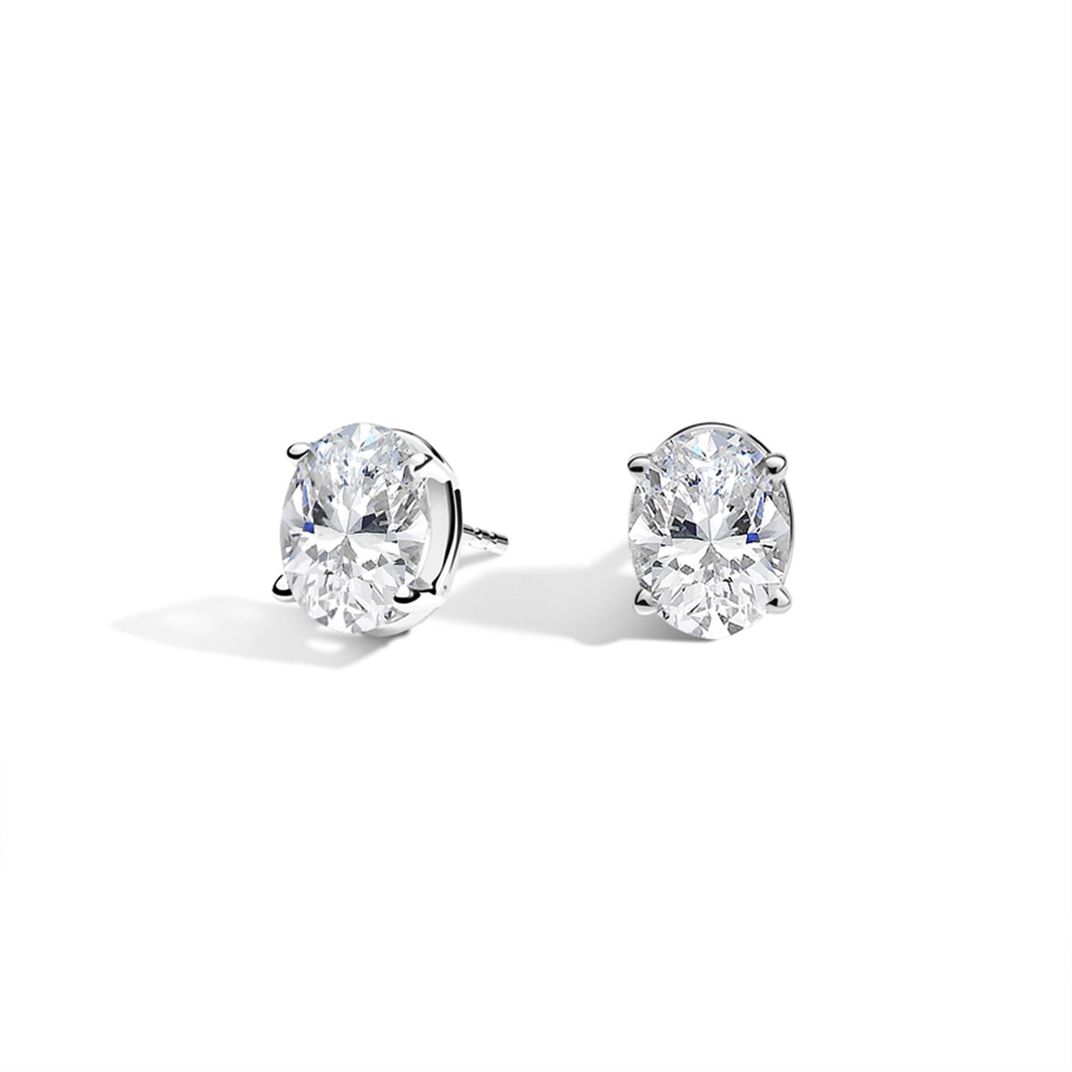14Kt White Gold Oval Stud Earrings .75cttw Natural Diamonds