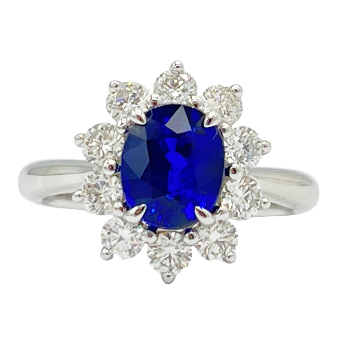 18Kt White Gold Halo Ring with Oval Sapphire and Diamonds