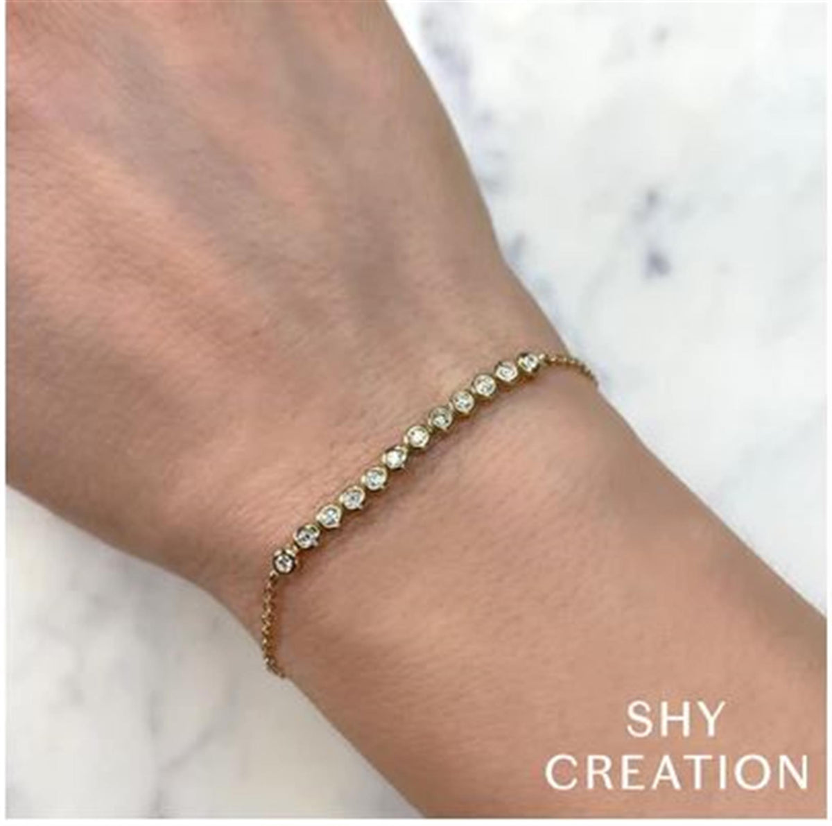 Shy Creation 14Kt Yellow Gold 7" Adjustable Bracelet with Bezel Set Diamonds