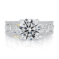 A. Jaffe Round Center Diamond Engagement Ring with Bezel and Prong Set Band.