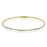 Yellow gold diamond tennis bracelet with classic line design and round brilliant-cut diamonds.