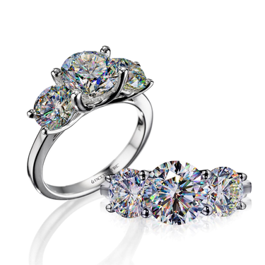 Facets Of Fire 14Kt White Gold Three Stone 0.70ct Round Center Natural Diamond Engagement Ring