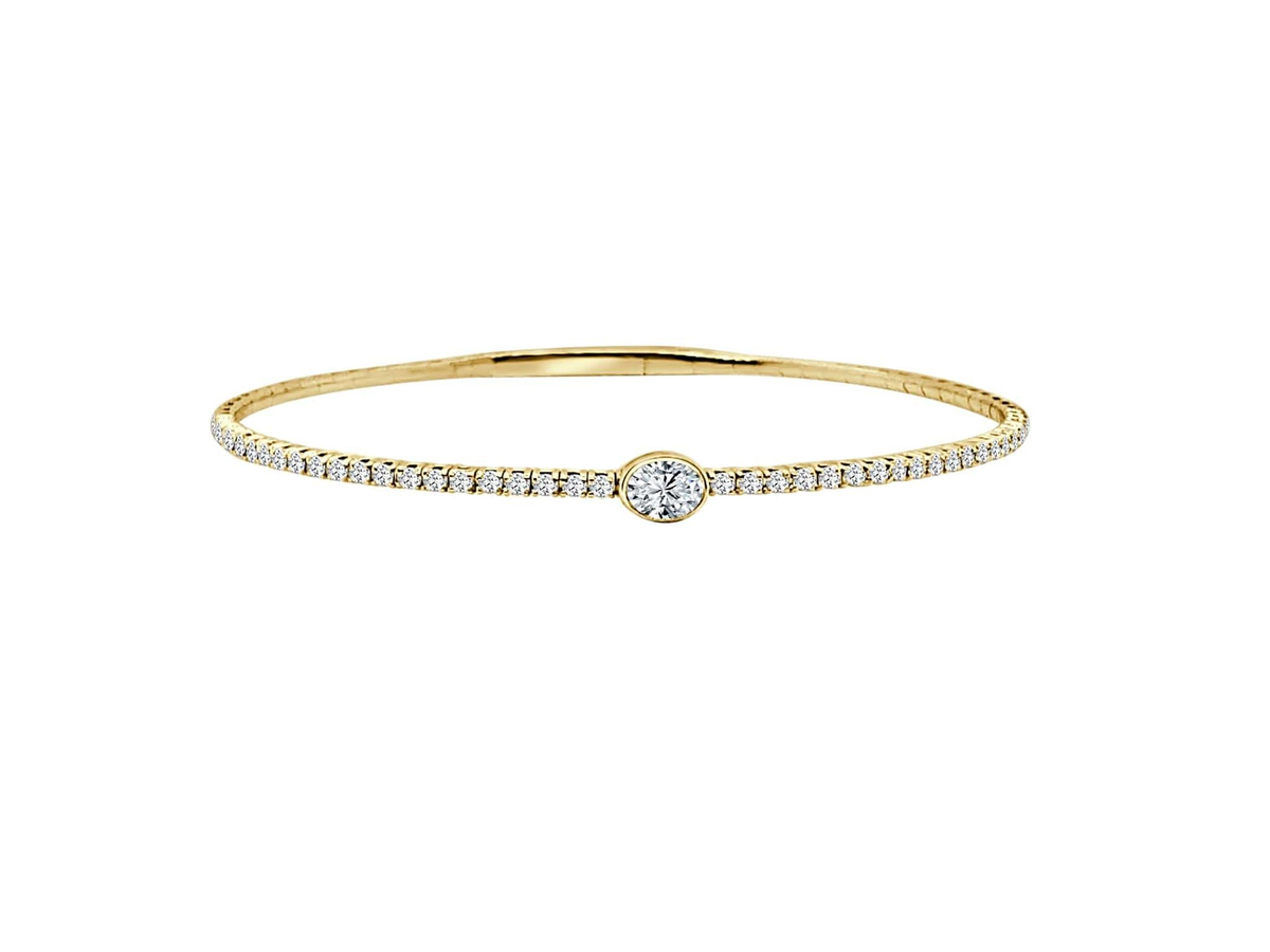 14Kt Yellow Gold Flexible Bangle with .20Ct Natural Oval Diamond and .44cttw Natural Accent Diamonds