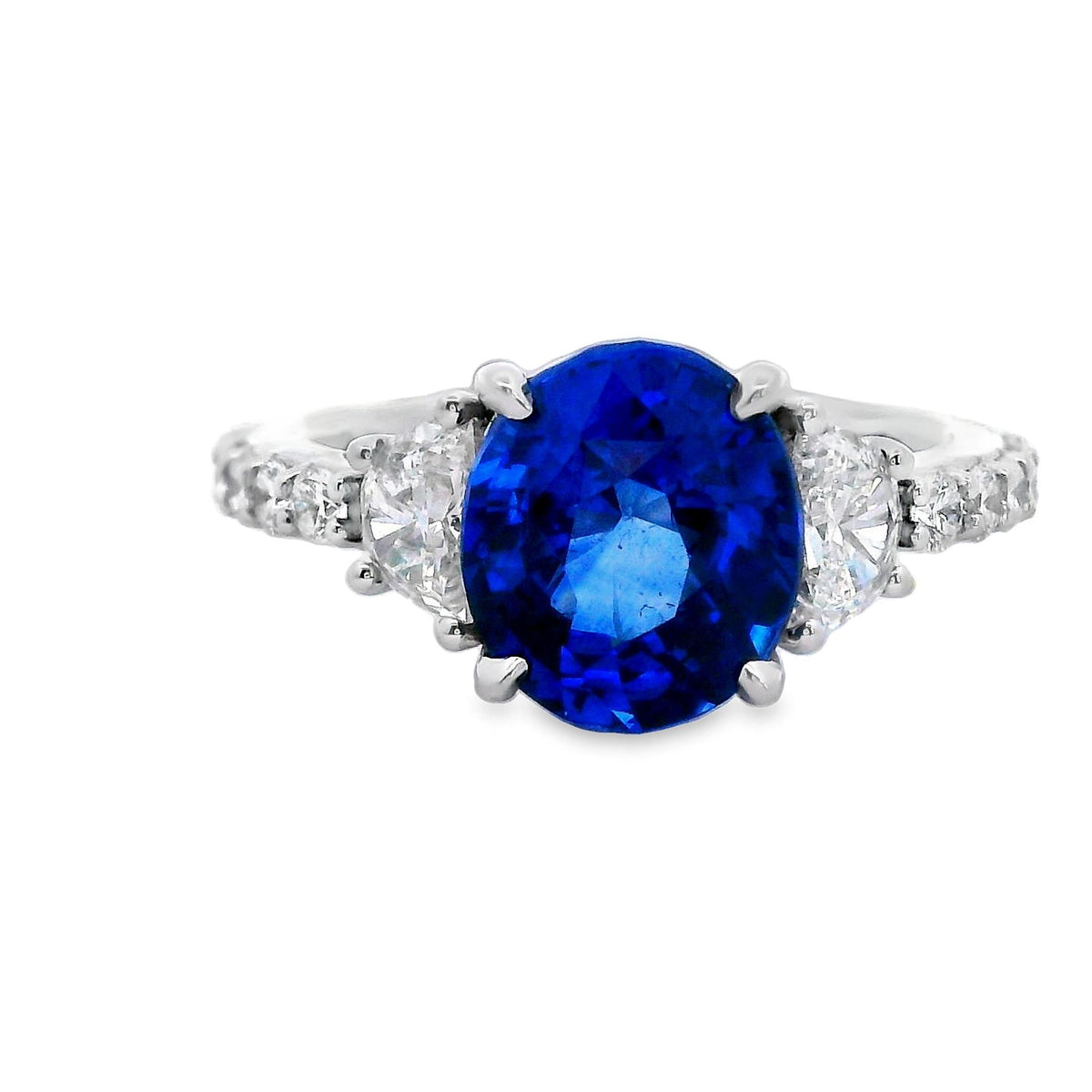 18Kt White Gold 3 Stone Ring with 3.17ct Sapphire and Natural Diamonds