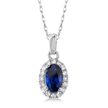10Kt White Gold Halo Birthstone Pendant with 5x3mm Oval Sapphire and .07cttw Natural Diamonds (Color H-I, Clarity SI2)  on an 18" Chain