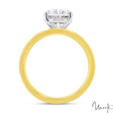 Yellow gold engagement ring with oval-cut diamond solitaire in a classic four-prong setting.