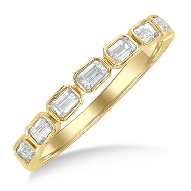 14Kt Yellow Gold East West Bezel Set Stackable Band with seven Natural Emerald Cut Diamonds totalling .70cttw (Color I-J, Clarity SI)