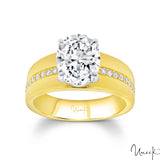 Yellow gold engagement ring featuring an oval-cut center diamond with pavé diamond halo and accent band.
