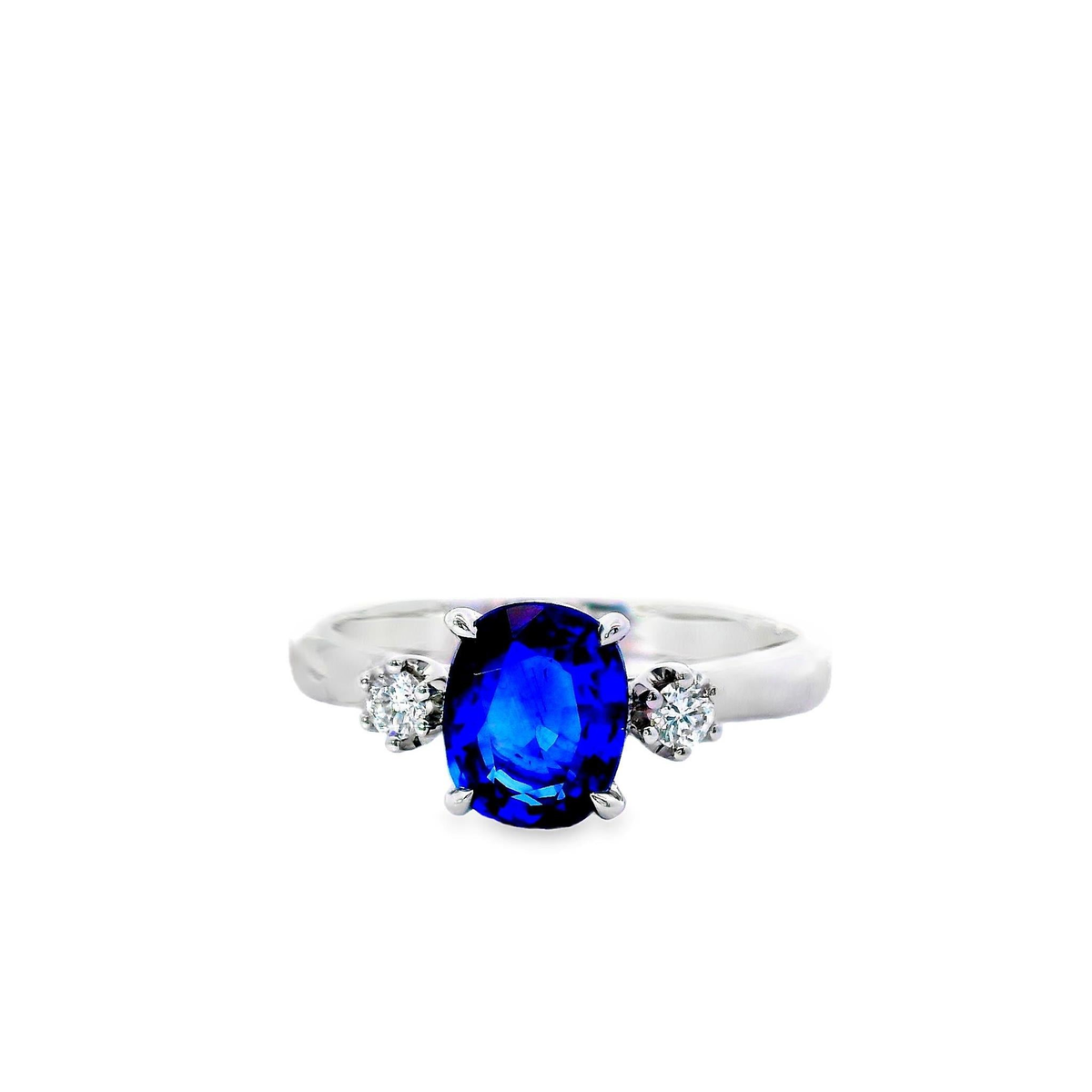 18Kt White Gold 3-Stone Ring with 1.48Ct Oval Sapphire (7x6mm) and 2.15 Natural Diamonds (Color G-H, Clarity SI1)