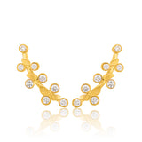 Yellow gold statement earrings featuring clustered leaf-inspired gemstone accents.