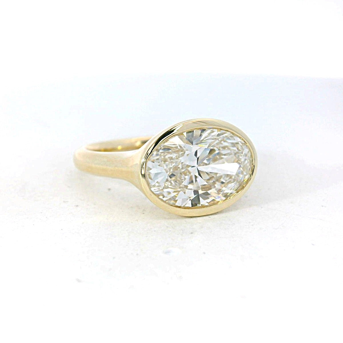Lasker’s Big Rocks Lab-Grown Diamond Ring Collection 14Kt Yellow Gold Lab-Created Oval Diamond East-West Bezel Set Solitaire