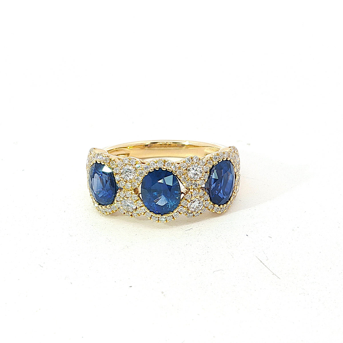 18Kt Yellow Gold 3-Stone Halo Ring with Natural Sapphires and Diamonds