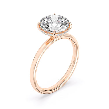 Lasker Big Rocks Lab-Grown Diamond Collection Hidden Halo Solitaire Ring in 14Kt Yellow Gold with 2Ct Round Center Diamond and .08cttw Accent Lab-Grown Diamonds. The sales of lab-grown diamonds are final after 30 days. Lab-grown diamonds and lab-grown