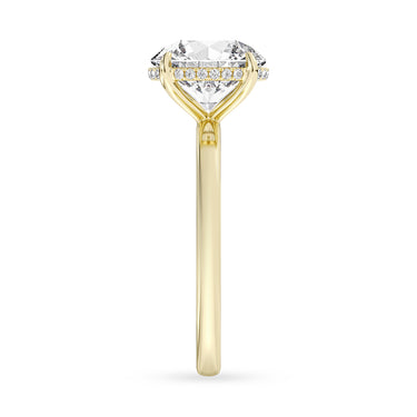 Lasker Big Rocks Lab-Grown Diamond Collection Hidden Halo Solitaire Ring in 14Kt Yellow Gold with 2Ct Round Center Diamond and .08cttw Accent Lab-Grown Diamonds. The sales of lab-grown diamonds are final after 30 days. Lab-grown diamonds and lab-grown