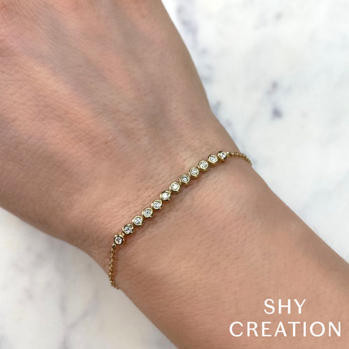 Shy Creation 14Kt White Gold Bracelet with Natural Bezel Set Diamonds