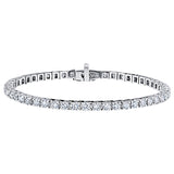 White gold diamond eternity band featuring pavé-set round diamonds.