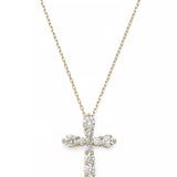 Yellow gold cross pendant necklace featuring a larger pavé diamond cross pendant.