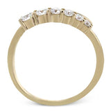 Yellow gold diamond eternity band with round brilliant-cut diamonds in a continuous shared-prong design.