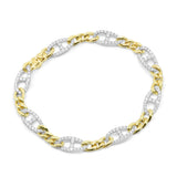 Yellow gold bracelet with alternating polished links and diamond-accent stations.