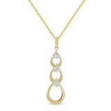 Yellow gold pendant necklace featuring interlocking circular diamond accents on a delicate chain