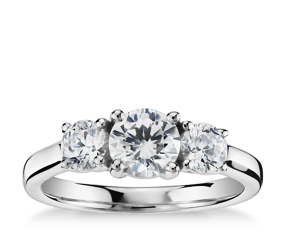 18Kt White Gold Three Stone With .79ct Round Center Natural Diamond